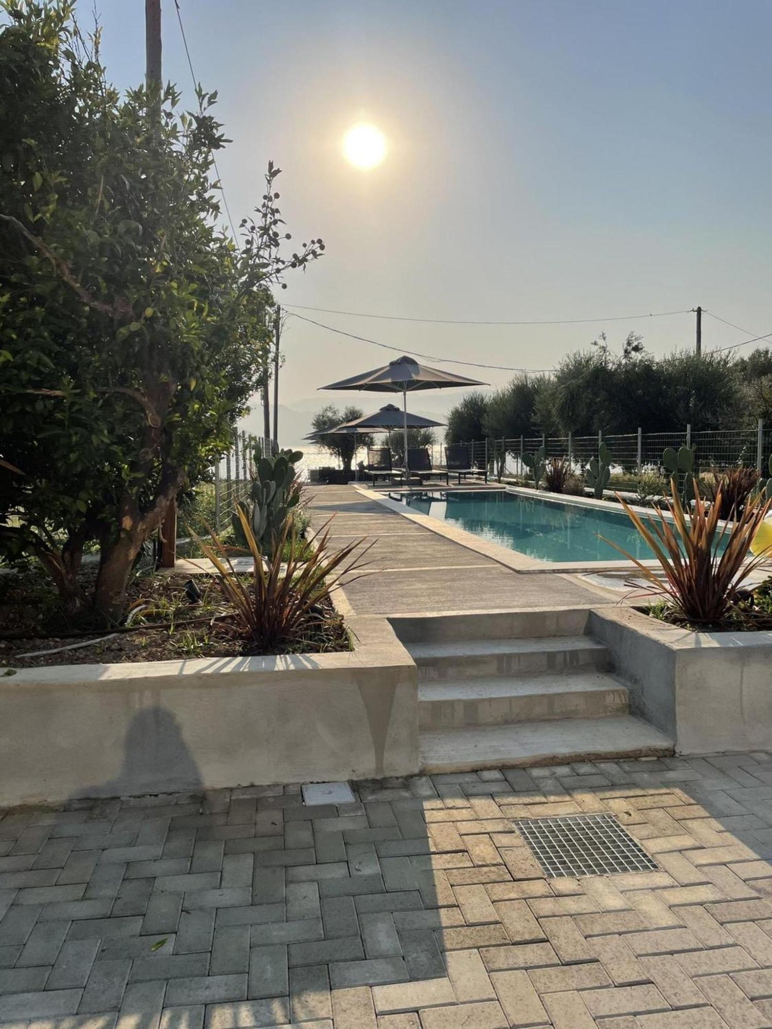 Blue Symphony Suites Apartments Никиана Екстериор снимка
